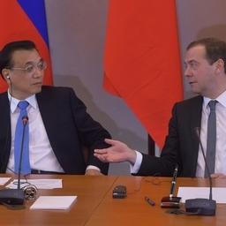 Заместитель премьера Государственного совета КНР Ван Ян п председатель правительства России Дмитрий МЕДВЕДЕВ. Фото пресс-службы правительства РФ