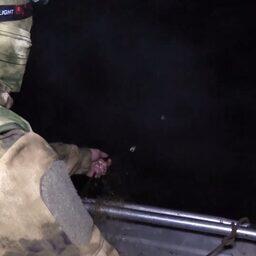 Изъятие незаконной установленной рыболовной сети. Кадр оперативной съемки